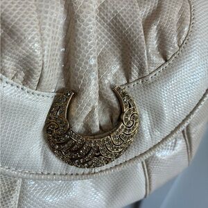 Elegant Cream Handbag with Gold Accent